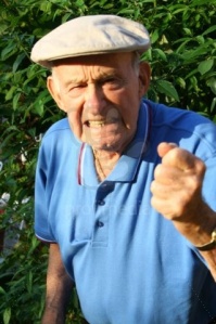 angry grumpy old man shaking his fist at the world